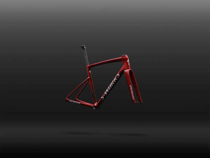 Specialized S-Works Tarmac SL9 road bike frameset in Vivid Red with Tarmac Black detailing and white S-Works graphics, shown in profile against a dark studio background