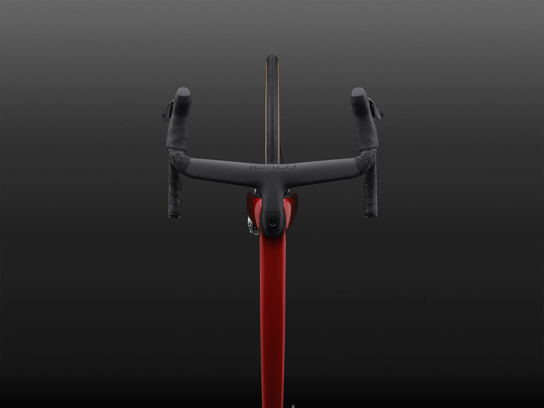 Specialized S-Works Tarmac SL9 SRAM AXS cockpit and stem detail, shown against a dark studio background
