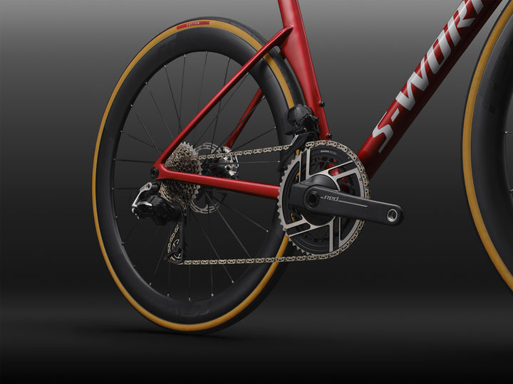 Specialized S-Works Tarmac SL9 SRAM AXS drivetrain detail showing SRAM Red AXS wireless groupset, shown against a dark studio background