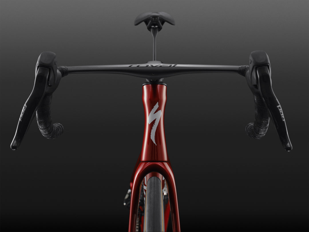 Specialized S-Works Tarmac SL9 SRAM AXS handlebar and cockpit detail, shown straight on against a dark studio background