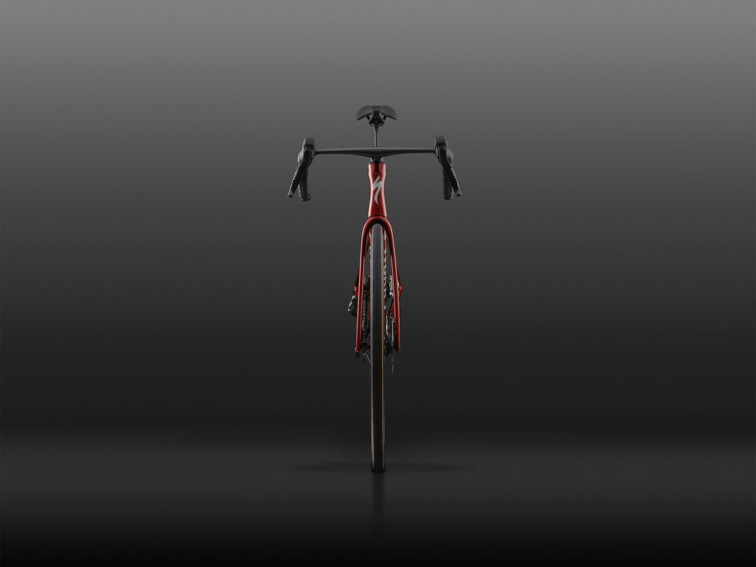Specialized S-Works Tarmac SL9 SRAM AXS in Ruby Metallic / White Silver Metallic, shown straight on from the front against a dark studio background