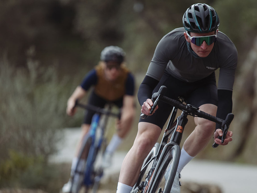 Riders on Argon 18 Krypton Pro bikes on a mixed-surface road