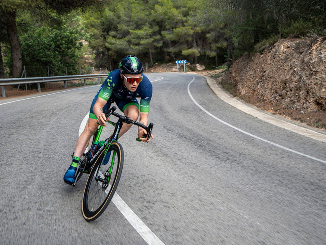 Rider cornering on the Argon 18 Sum Pro on a mountain road