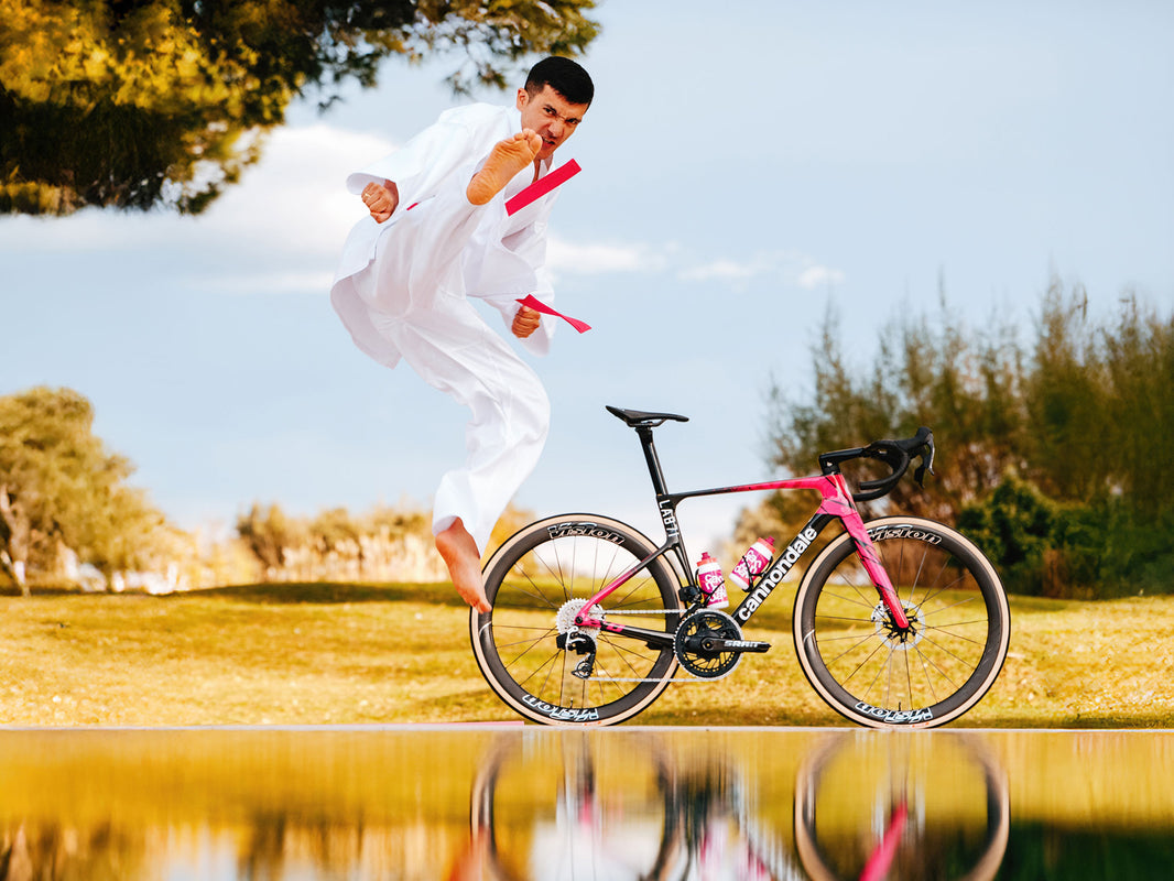 Rider with a Cannondale SuperSix EVO beside a lake