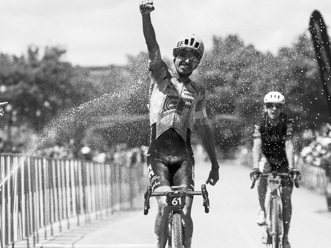 Rider celebrating a gravel race win on a Cannondale SuperX