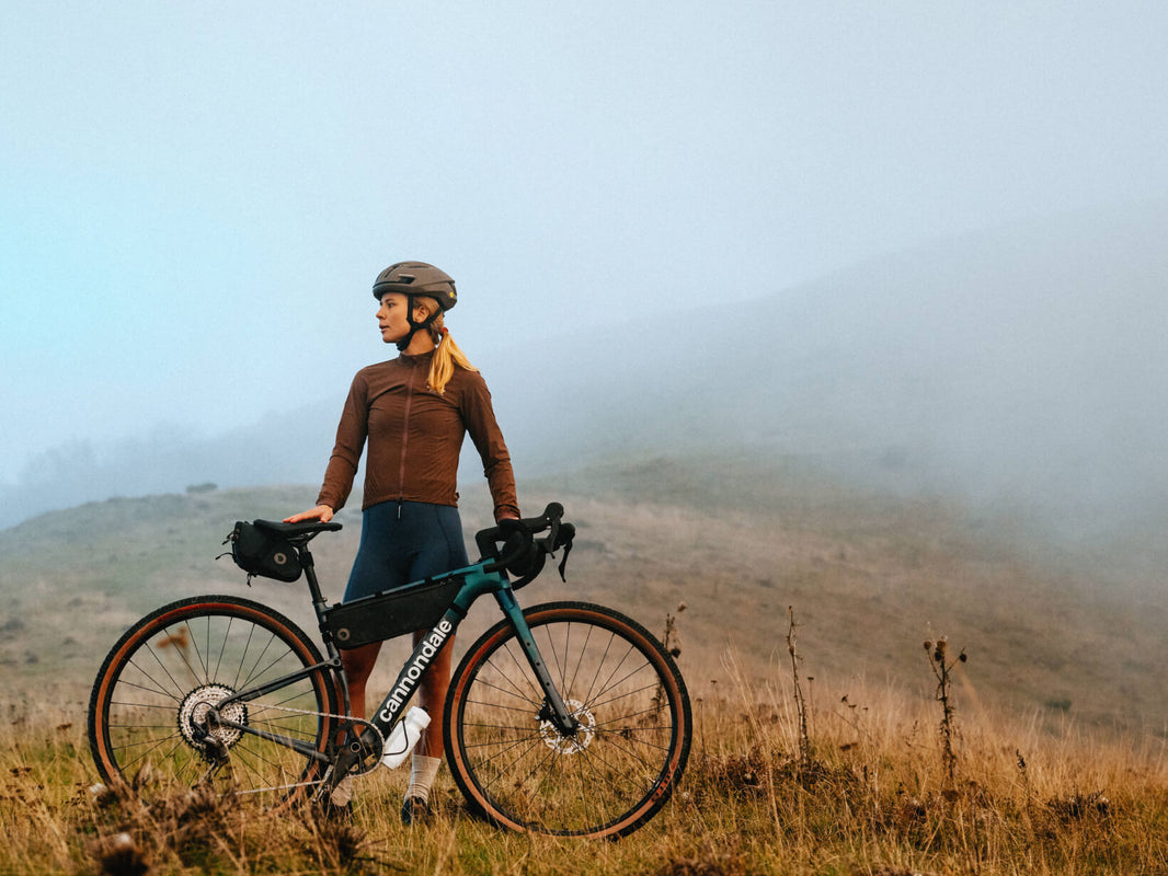 Rider with a bikepacking-loaded Cannondale Topstone Carbon