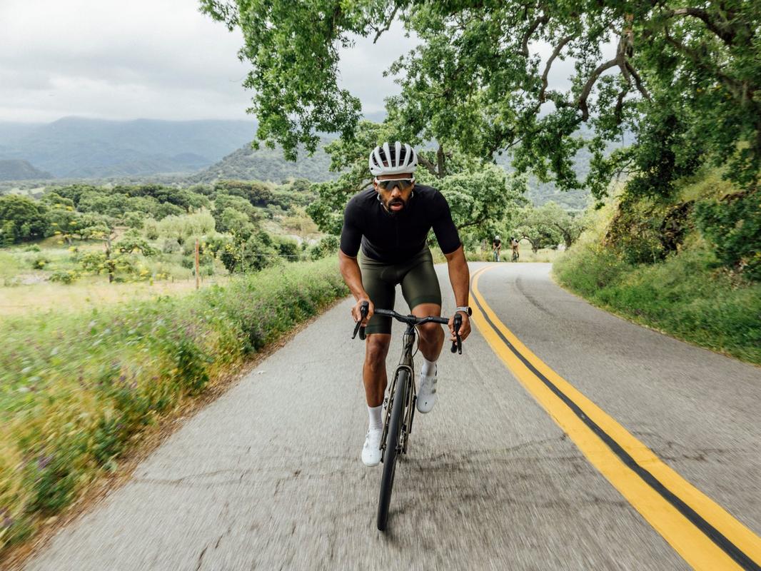 Rider climbing on a Specialized Roubaix SL8